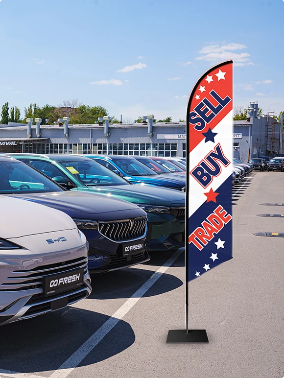 Feather flag at a car dealership lot on a square base
