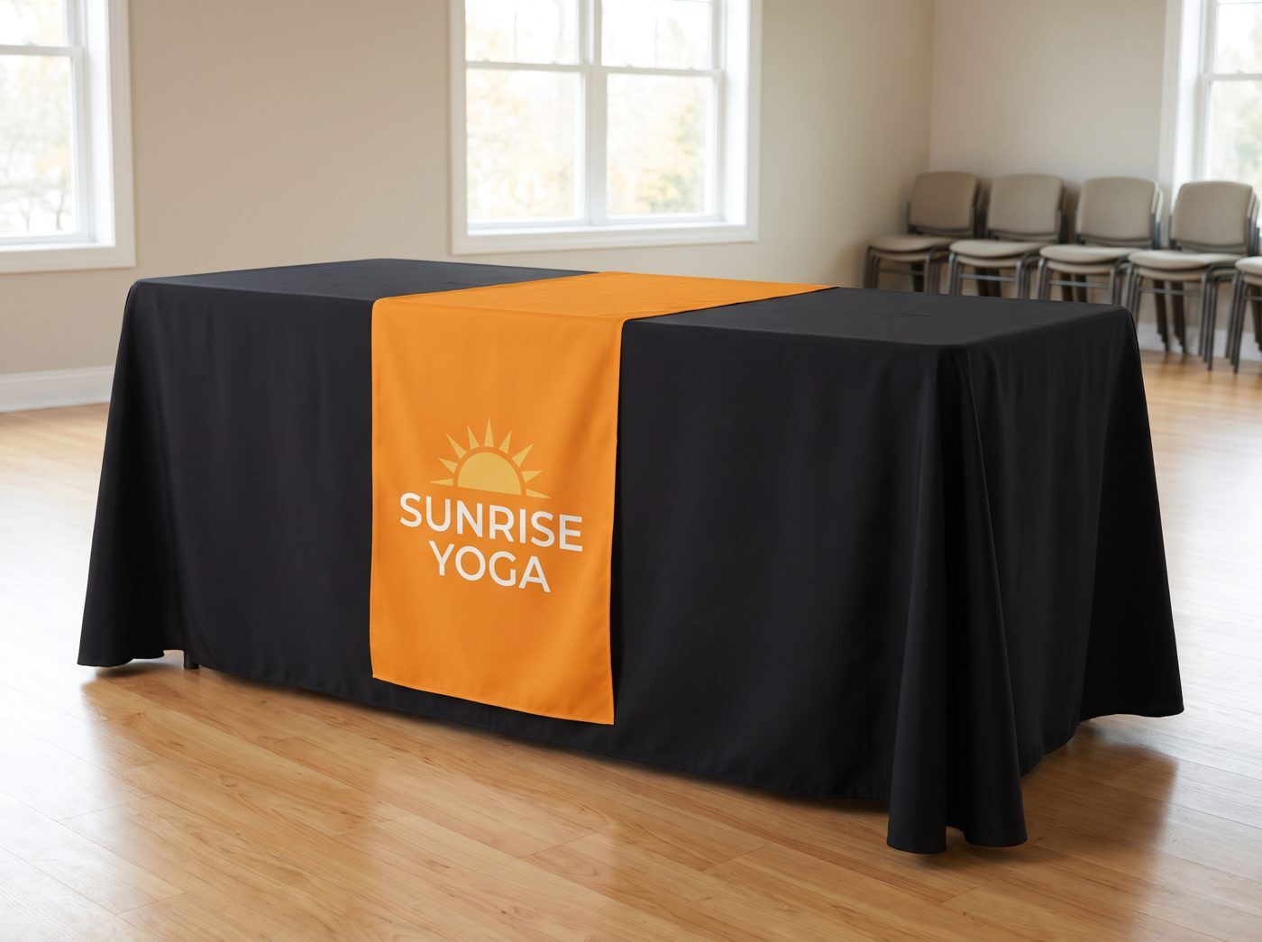 Custom printed table runner over a solid black table throw