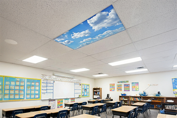 School classroom with a cloud magnetic light cover on a 2x4 ceiling light