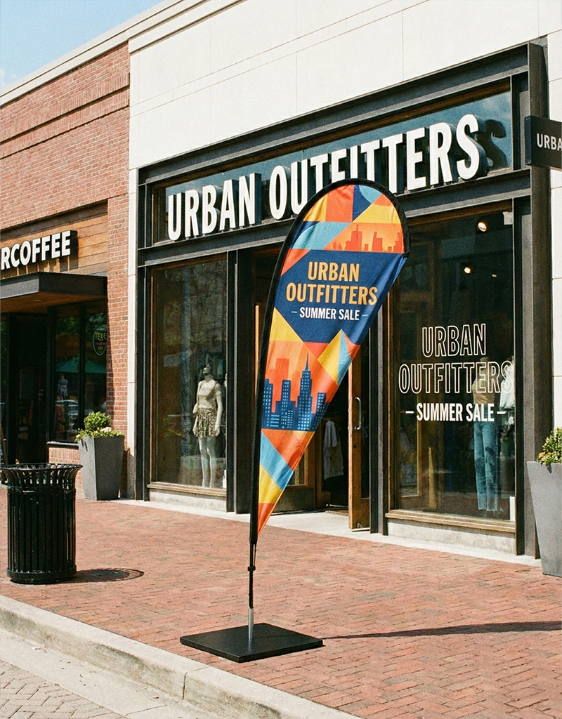 Teardrop flags outside retail storefront