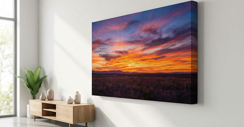 Gallery wrapped canvas displayed on a modern living room wall showing 1.5 inch depth and image wrap edge finish